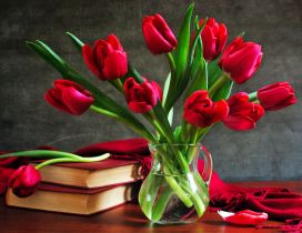Red books and wonderful bouquet of red tulips - Flowers