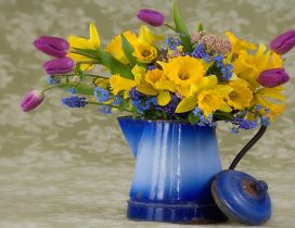 Old vase with wonderful spring flowers