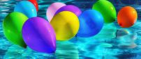 Colorful balloons in the pool - HD summer wallpaper
