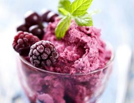 Frozen raspberries in a delicious ice cream cup