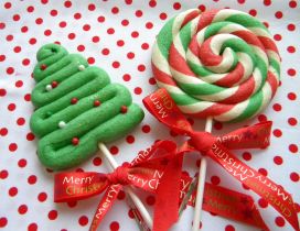 Happy winter holiday - Christmas candies on the stick