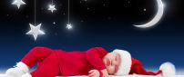 Small kid sleep and waiting for Santa Claus - Stars and moon