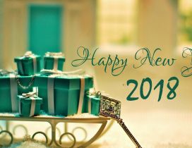 Green boxes with presents for a new beginning - Happy 2018