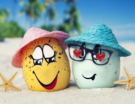 Two funny eggs on the beach - Love moments