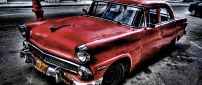 Red old car in the town - HD wallpaper