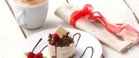 Enjoy a piece of cake with a delicious hot chocolate - Love