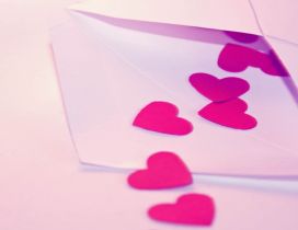 Pink paper hearts in an envelope - HD Valentine's Day
