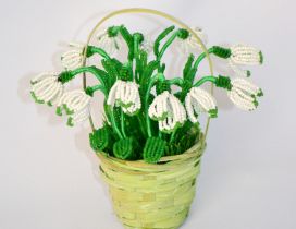 Abstract snowdrops flower in a basket - Spring gift