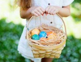 Easter eggs in a basket - Happy Spring Holiday