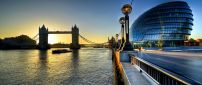 London Bridge and the Sun rise up - modern building in right