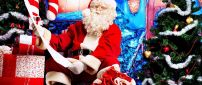 Santa Claus and the big list with gifts for children