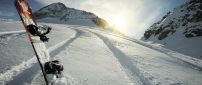 Wonderful sunshine over the white snow - Snowboarding