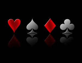 Four symbols of the Poker game - Red and black colors