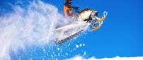 Wonderful jump with sky jet moto - winter sports time