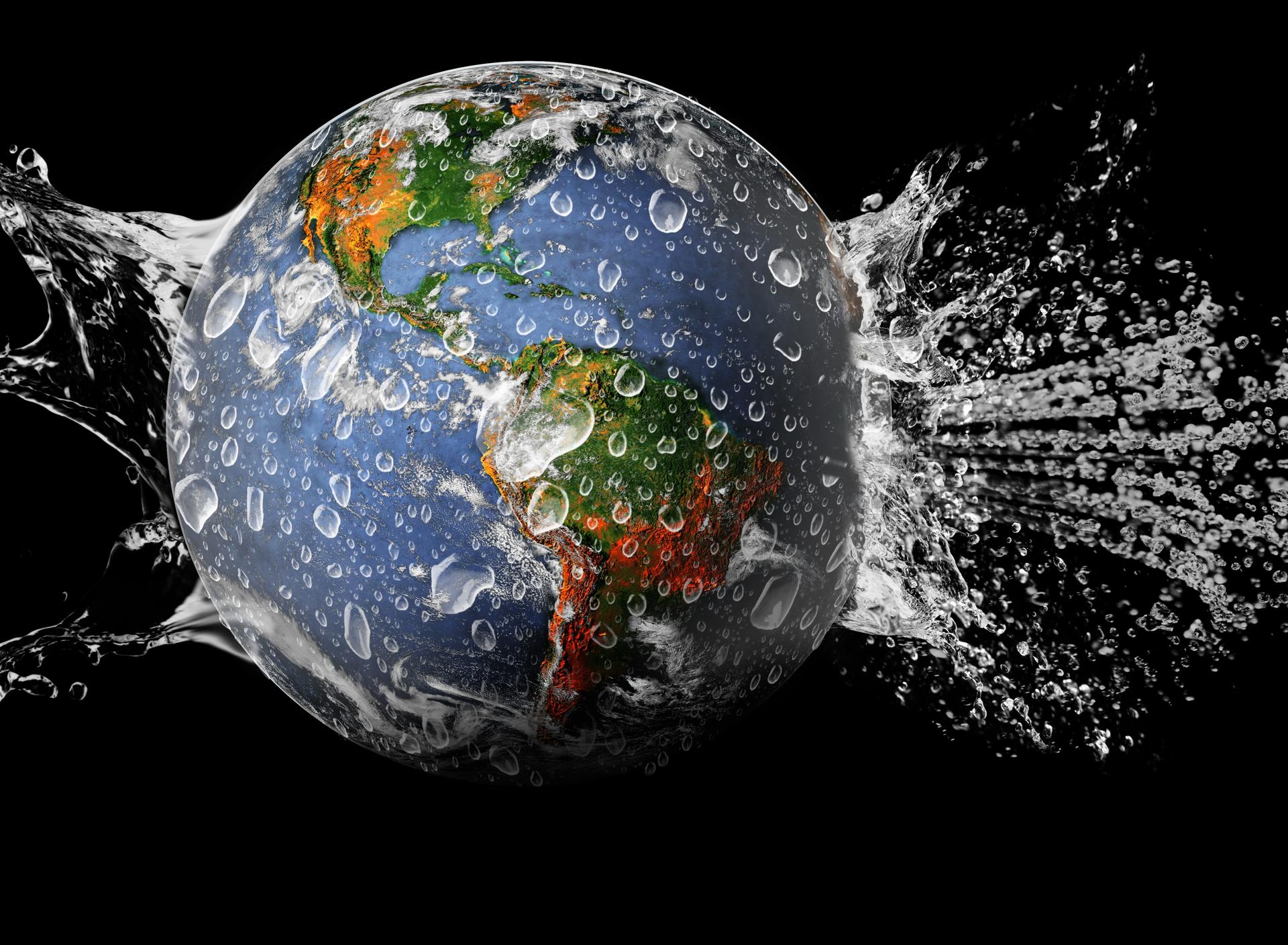 The Earth Globe in the water on the black background