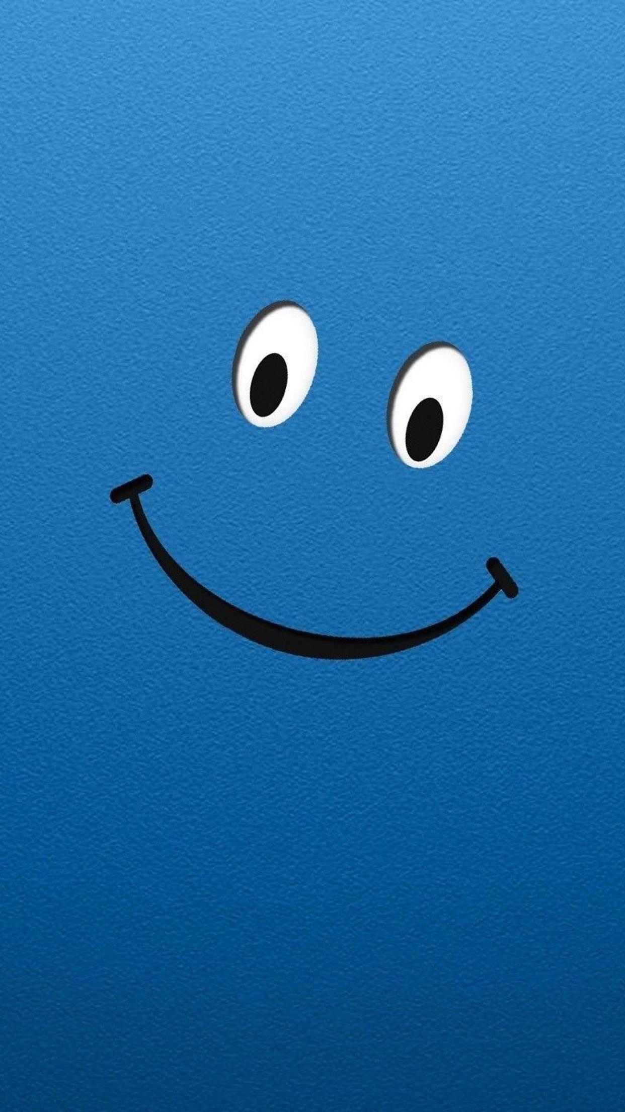 Two eyes and a happy smile face on a blue background
