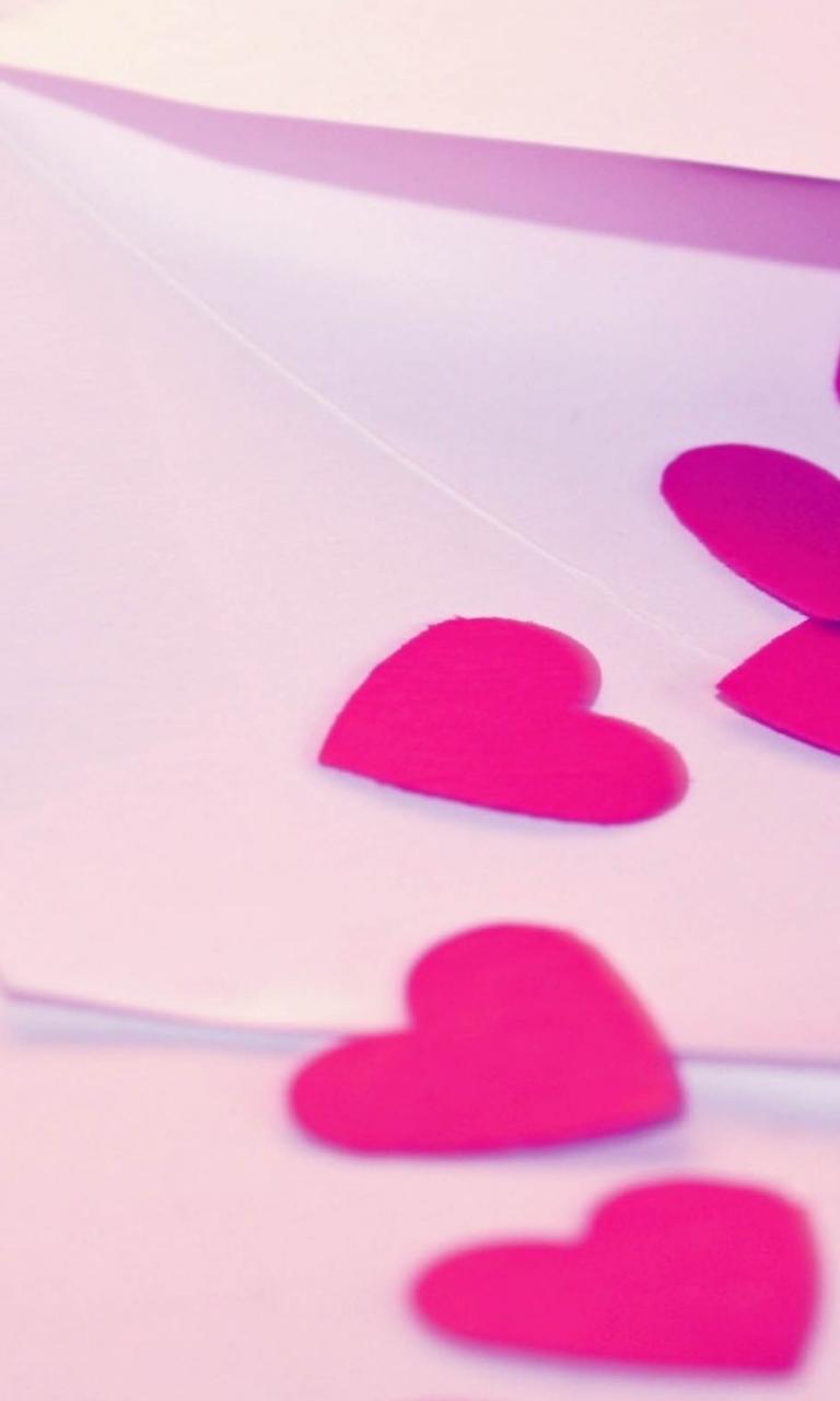 Pink paper hearts in an envelope - HD Valentine's Day